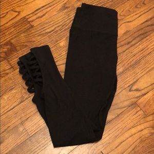 Nine West black leggings with ankle cut outs.